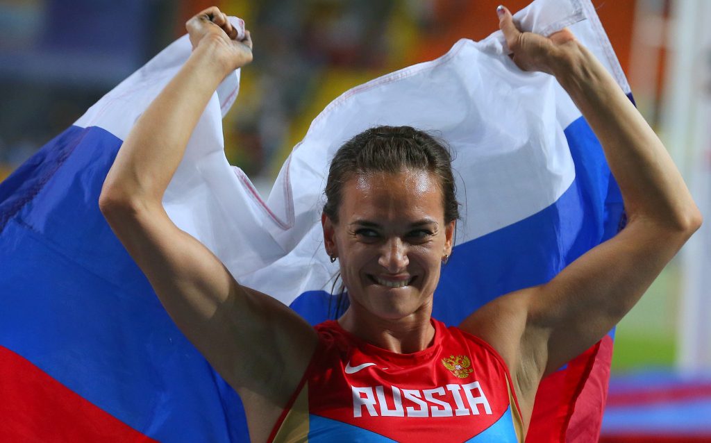 Елена Исинбаева после победы в финале соревнований по прыжкам с шестом на чемпионате мира по легкой атлетике / ТАСС